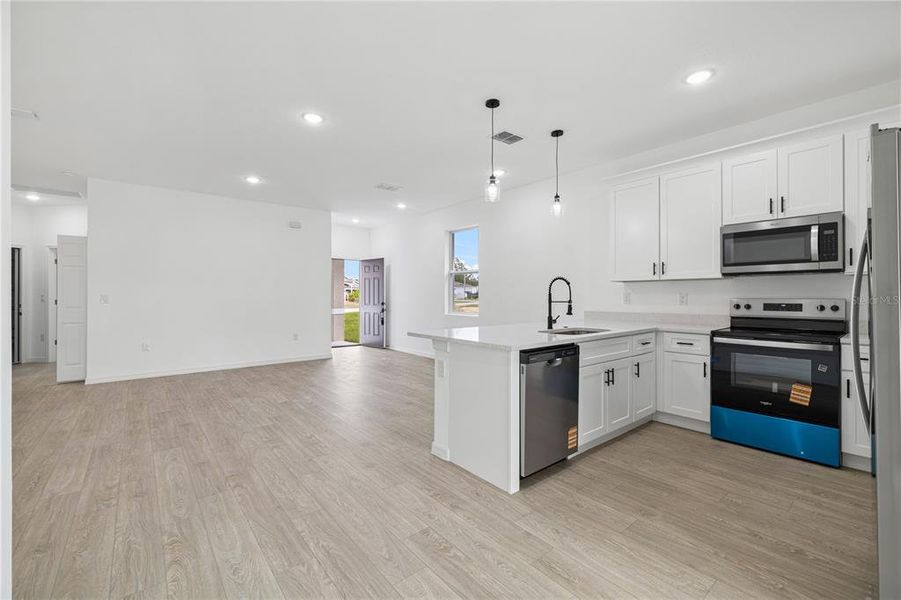 Furnished interior view inside a new home in , Poinciana (Image 7).