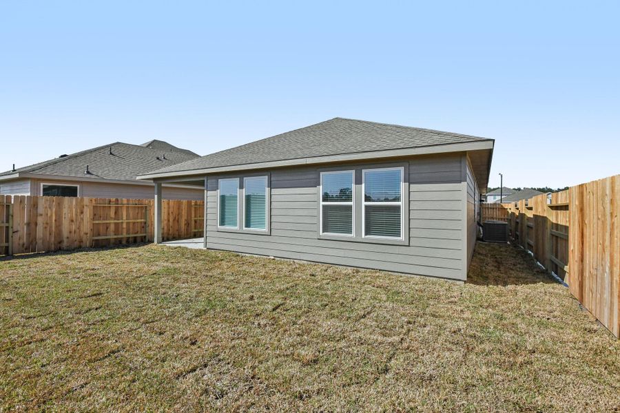 Exterior details and patio area of a home in Landing Meadows - Premier Series, New Caney (Image 24).