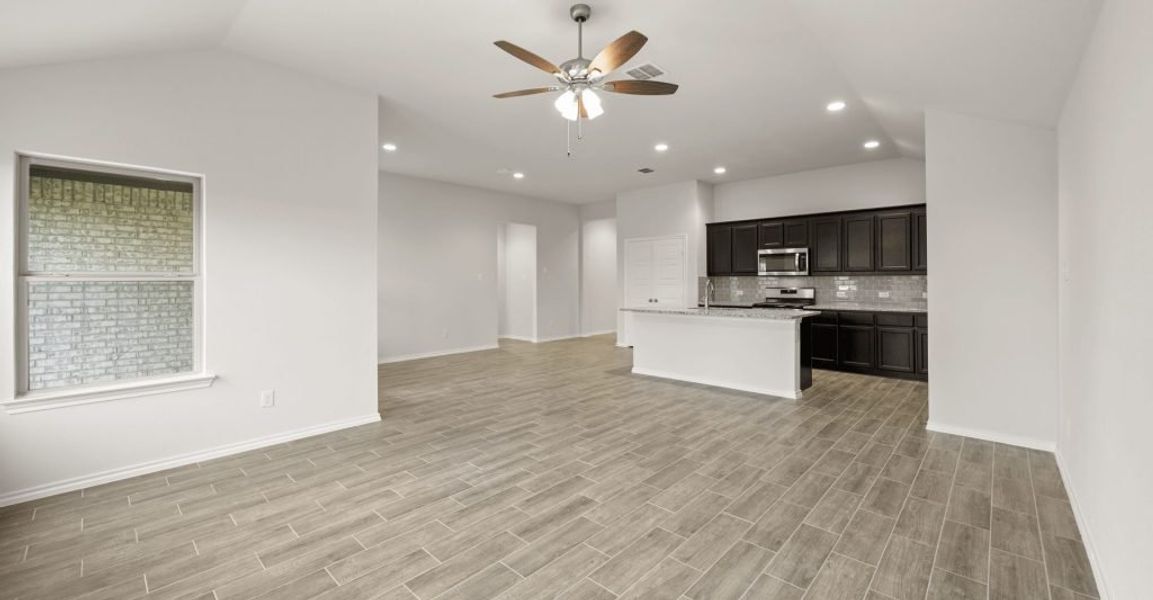 Representative exterior photo of a completed home built from the Boston by Impression Homes in Baker Farms, Cleburne, TX (Image 9).