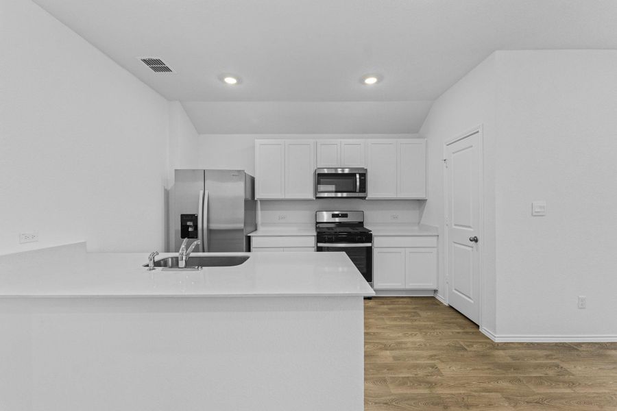 Furnished interior view inside a new home in Valverde, Bastrop (Image 9).