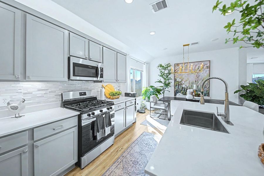 Furnished interior view inside a new home in Pinewood at Grand Texas, New Caney (Image 12).