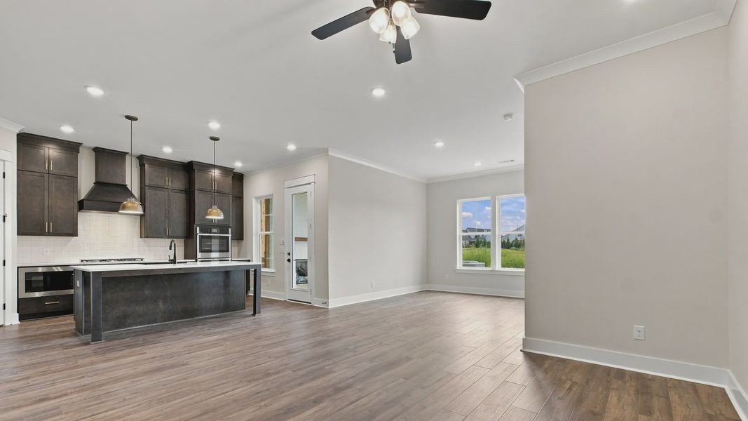 Dining space area next to kitchen with backyard view.