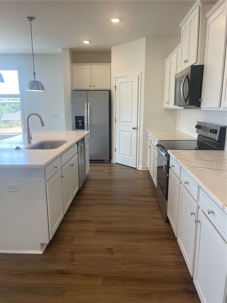 Furnished interior view inside a new home in Springwood Grove, Central (Image 9).