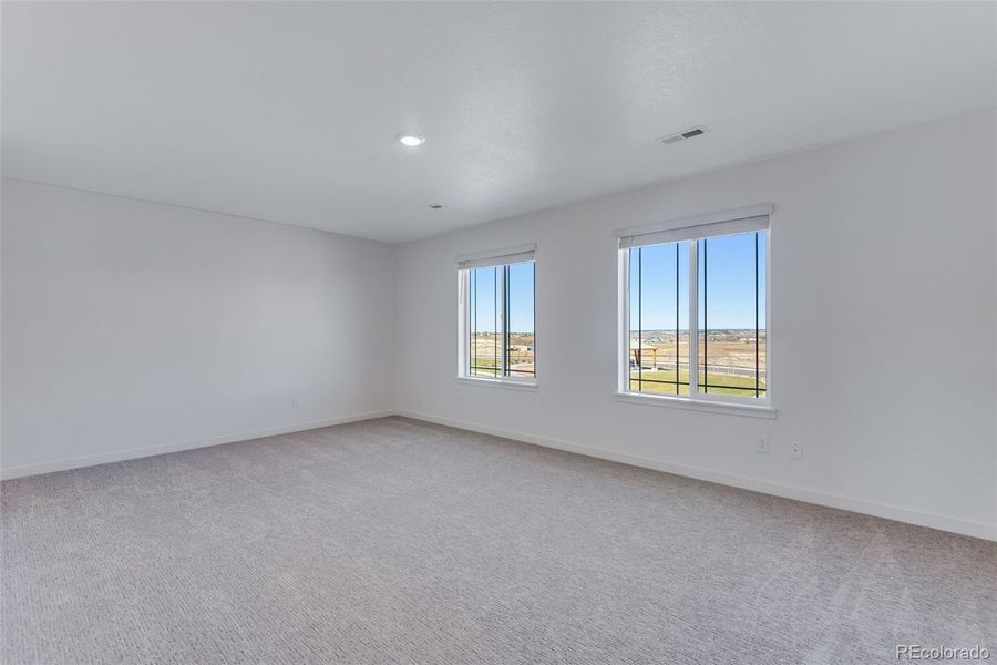 Spacious, unfurnished interior of a new home in Trails at Crowfoot, Parker (Image 25).