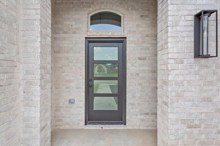 Entrance to property with brick siding Entrance to property with brick siding