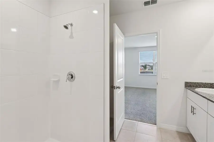 Furnished interior view inside a new home in Crosswinds - Signature Series, Haines City (Image 10).