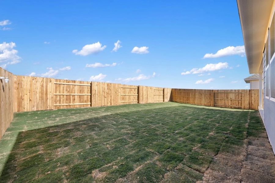 Exterior details and patio area of a home in Patterson Ranch, Georgetown (Image 28).