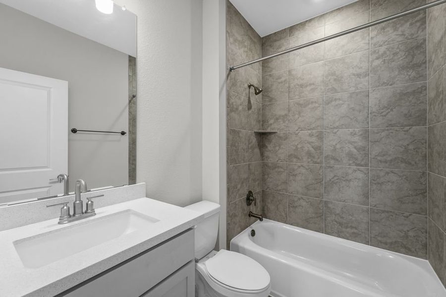 Furnished interior view inside a new home in Parkside on the River 60s, Georgetown (Image 9).