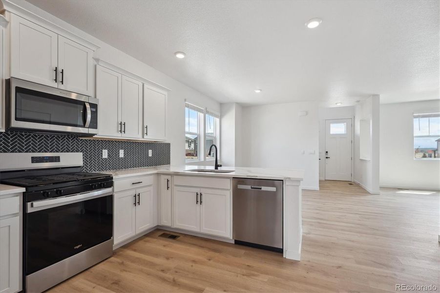Furnished interior view inside a new home in Horizon Uptown, Aurora (Image 5). Furnished interior view inside a new home in Horizon Uptown, Aurora (Image 5).