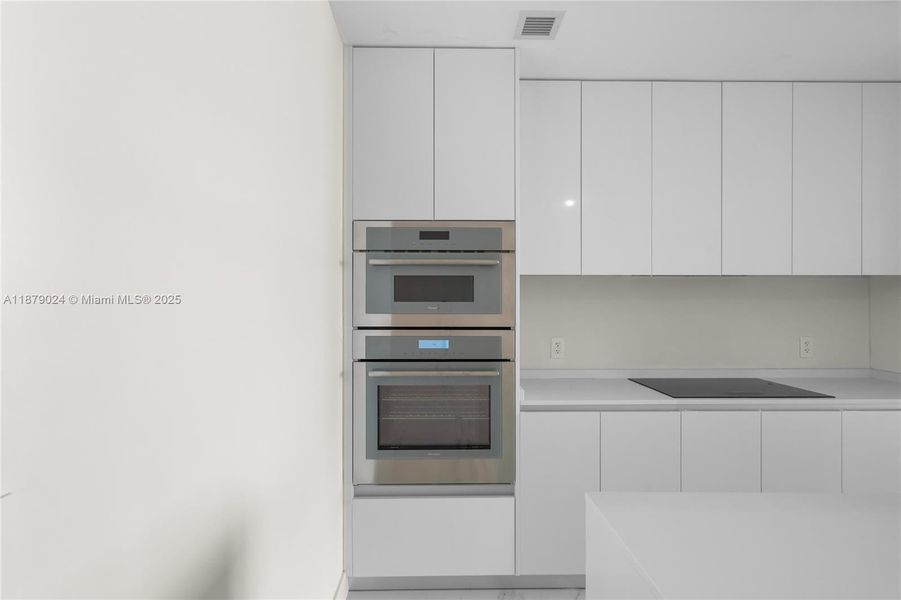 Furnished interior view inside a new home in Aria Reserve, Miami (Image 13).