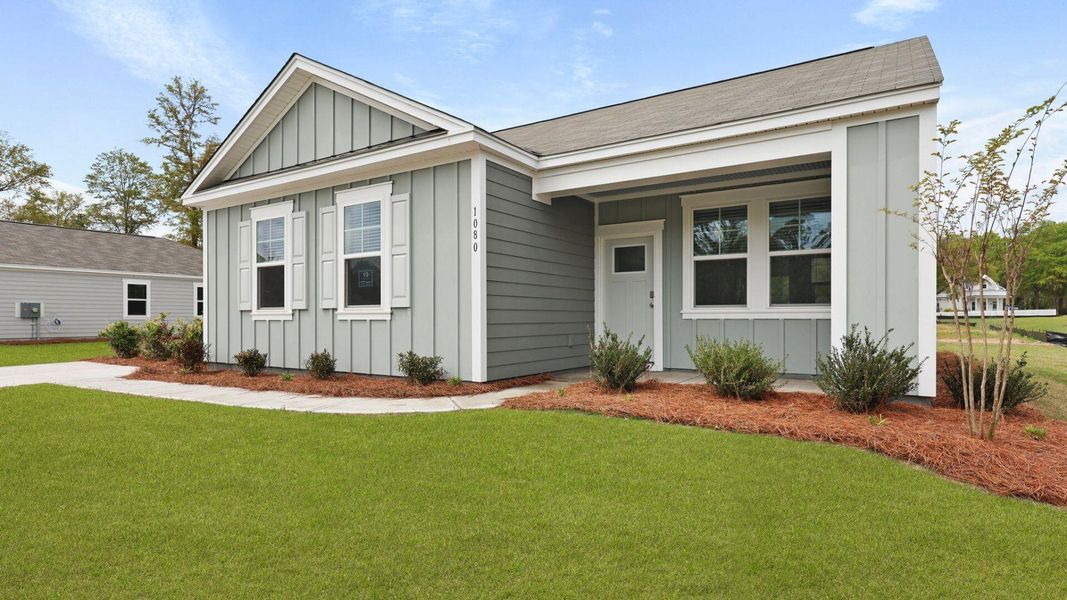 Front exterior of a new home in North Shore, Summerton, SC, highlighting curb appeal (Image 19).