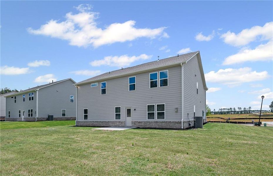 Exterior details and patio area of a home in Anderson Point Estates, McDonough (Image 4).