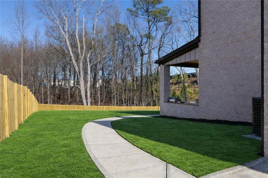 Exterior details and patio area of a home in , Suwanee (Image 36).
