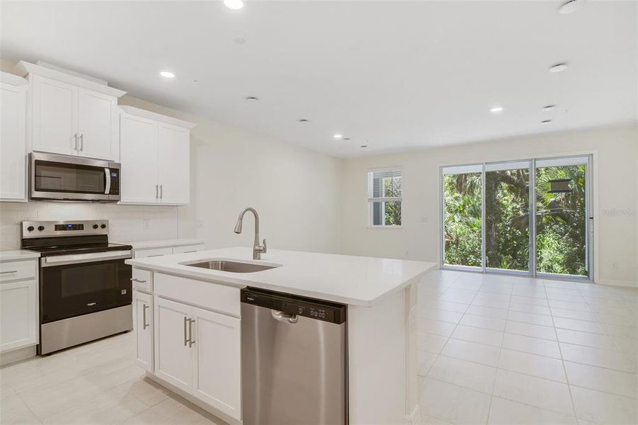 Furnished interior view inside a new home in Towns at Greenleaf, Oviedo (Image 12).