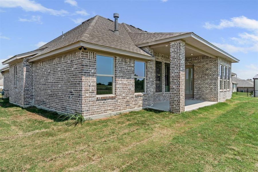 Front exterior of a new home in , Godley, TX, highlighting curb appeal (Image 20).