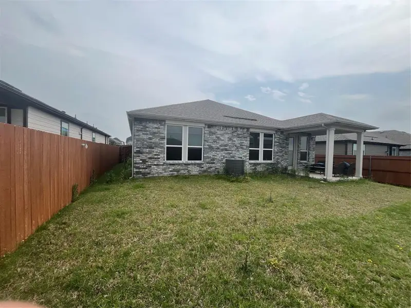 Exterior details and patio area of a home in , Crandall (Image 4).