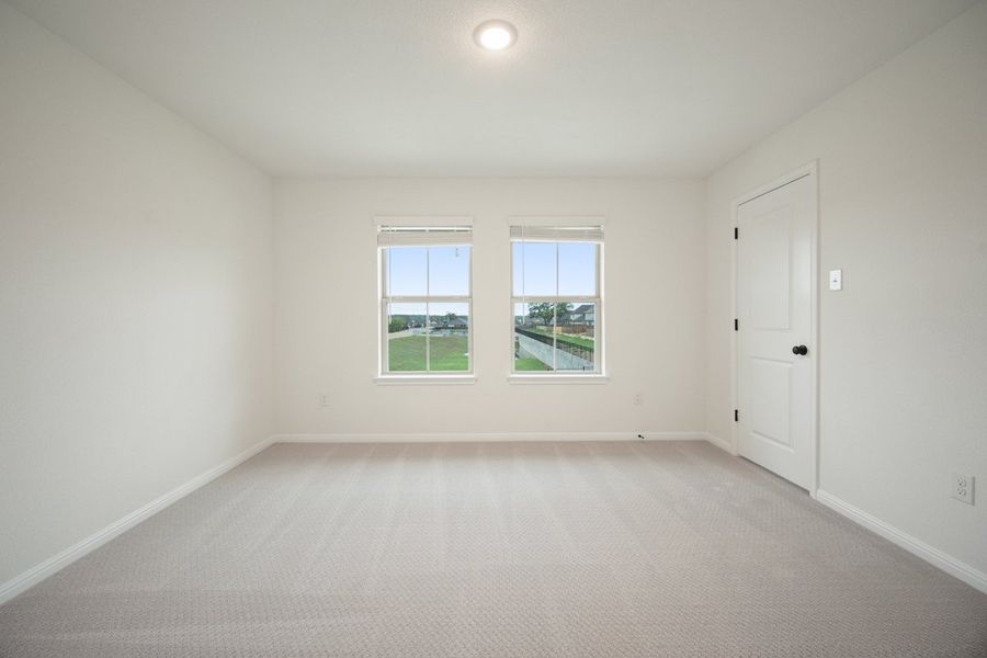 Spacious, unfurnished interior of a new home in The Hills of Bear Creek, Manchaca (Image 10).