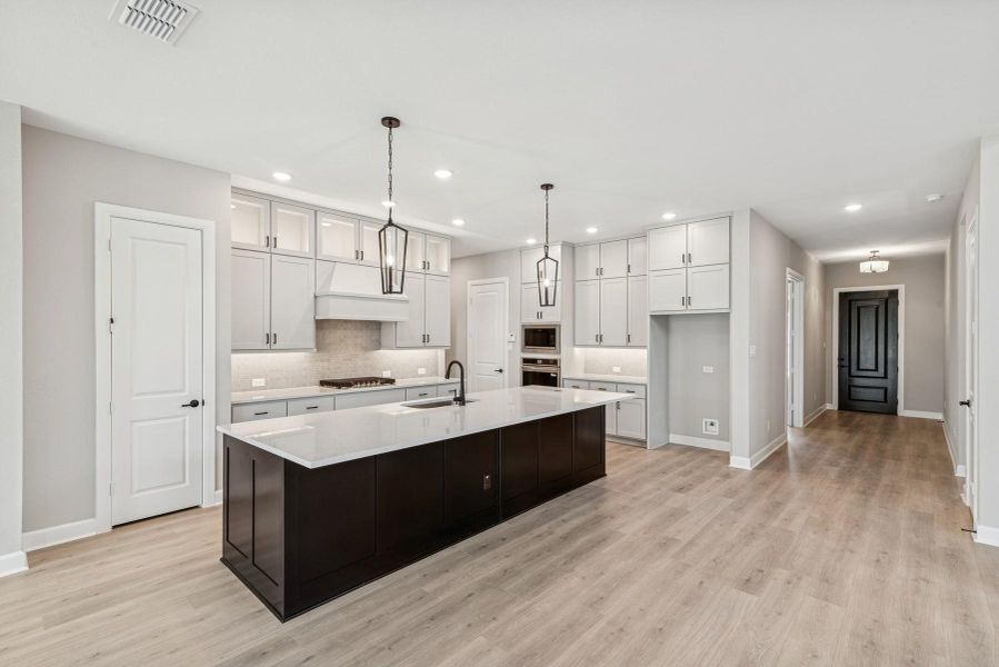 Furnished interior view inside a new home in Riceland 60’ Homesites, Mont Belvieu (Image 11).