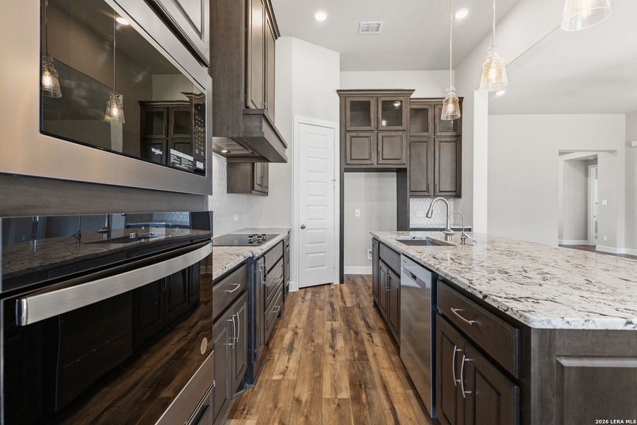Furnished interior view inside a new home in Pradera Ridge, Floresville (Image 7).