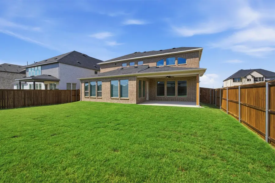 Exterior details and patio area of a home in Green Meadows, Celina (Image 29).