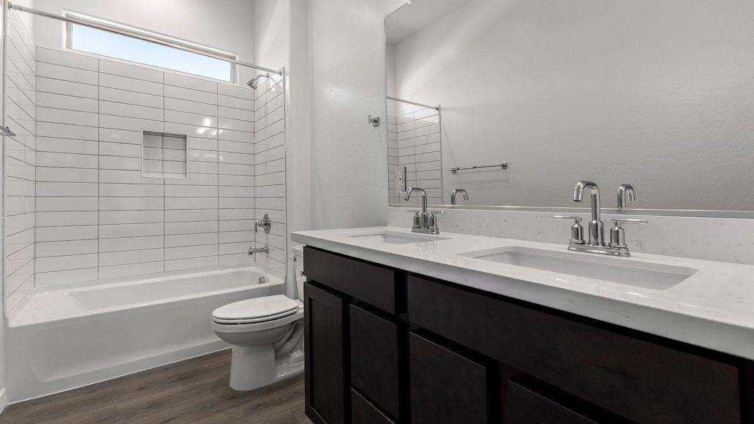 Furnished interior view inside a new home in Windrose, Waddell (Image 20).