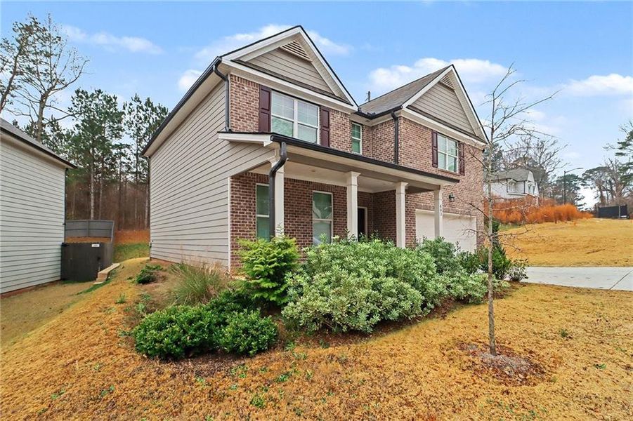 Front exterior of a new home in , Atlanta, GA, highlighting curb appeal (Image 8).