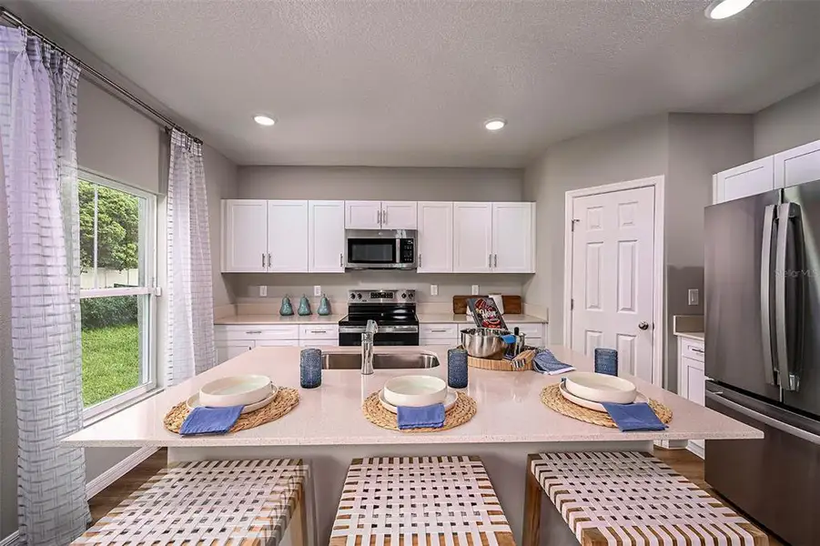 Furnished interior view inside a new home in Scenic Terrace, Haines City (Image 3).