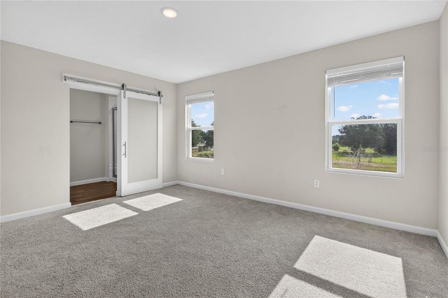 Spacious, unfurnished interior of a new home in Seasons at Forest Creek, Haines City (Image 26).