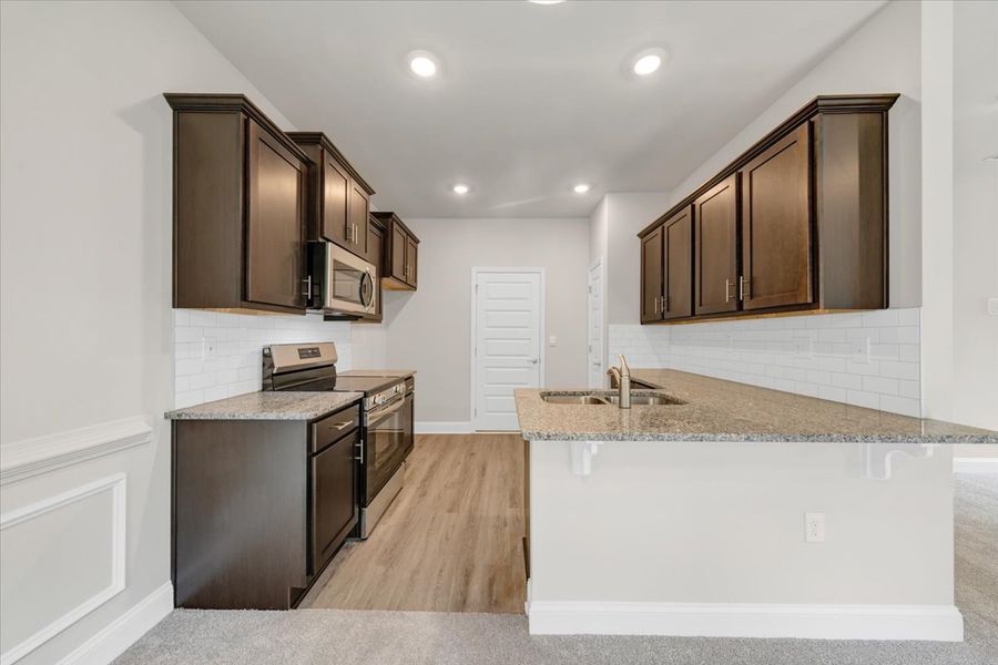 Furnished interior view inside a new home in Scarlett Place, Bowdon (Image 8).
