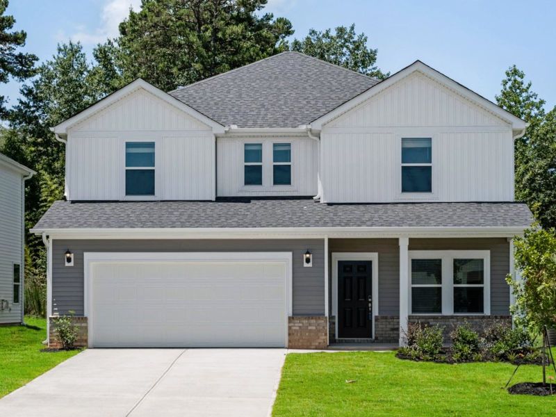 Front exterior of a new home in Vickery Station, Woodruff, SC, highlighting curb appeal (Image 1).