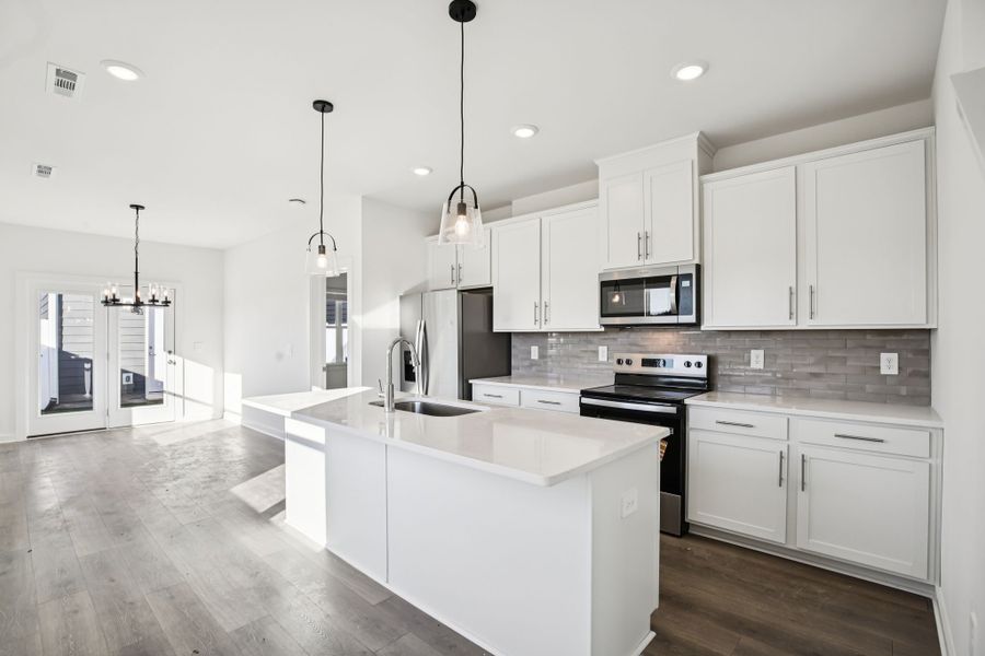 Furnished interior view inside a new home in Greystone - Vista Townhomes, Smyrna (Image 6).