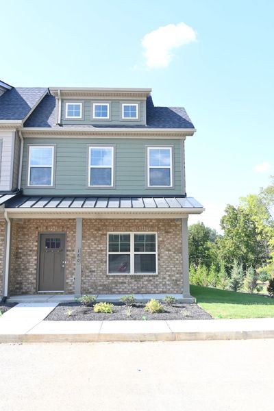 Front exterior of a new home in Talia Trace, Smyrna, TN, highlighting curb appeal (Image 2). Front exterior of a new home in Talia Trace, Smyrna, TN, highlighting curb appeal (Image 2).