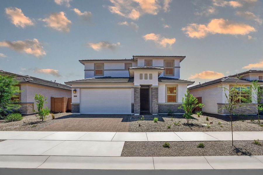 Front exterior of a new home in Artisan at Asante, Surprise, AZ, highlighting curb appeal (Image 21).