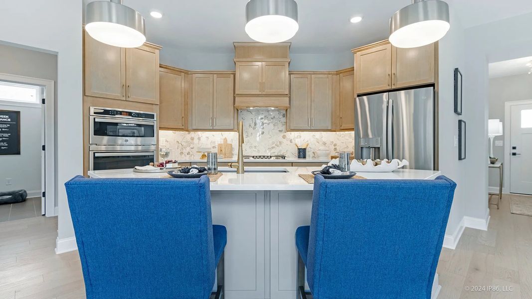 Furnished interior view inside a new home in The Courtyards at Bailey Farm, Dacula (Image 24).