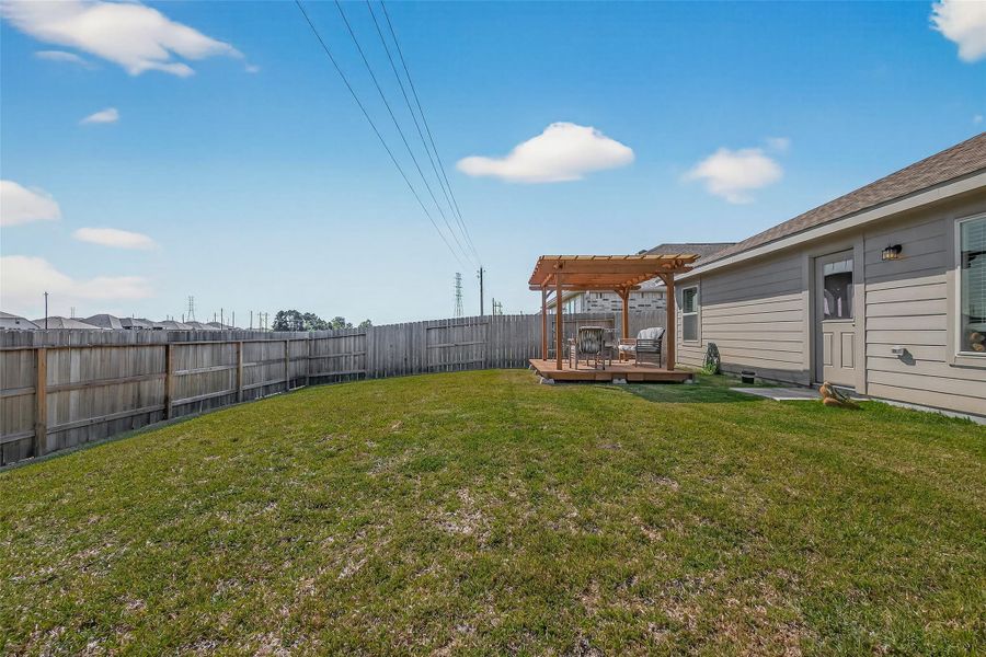 Exterior details and patio area of a home in , Baytown (Image 3).
