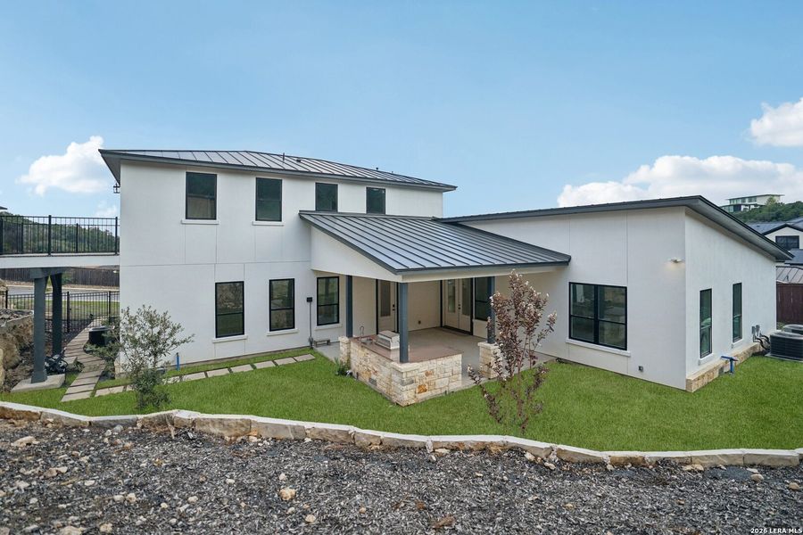 Exterior details and patio area of a home in , San Antonio (Image 30).