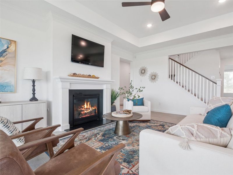 Cozy great room with fireplace (*Photo not of actual home and used for illustration purposes only.)