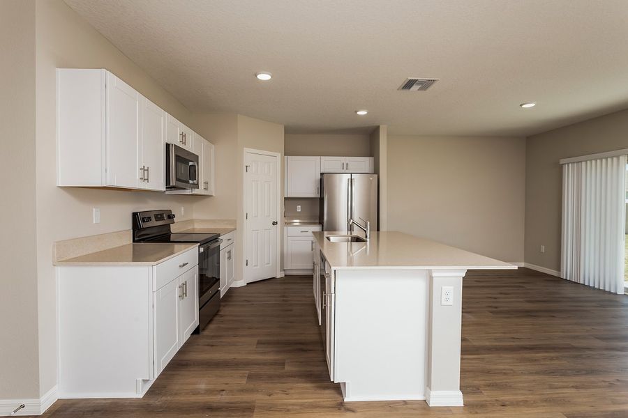 Furnished interior view inside a new home in Scenic Terrace, Haines City (Image 4).