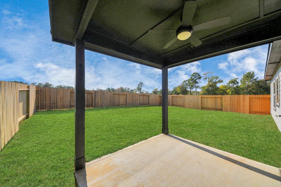 Exterior details and patio area of a home in Lexington Heights, Willis (Image 3). Exterior details and patio area of a home in Lexington Heights, Willis (Image 3).