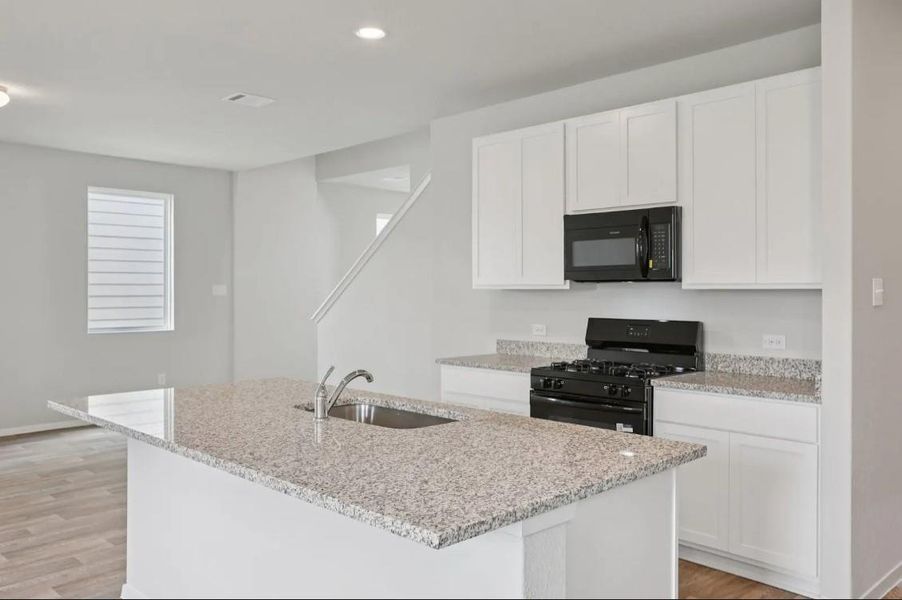 Furnished interior view inside a new home in Azalea, Pattison (Image 8).