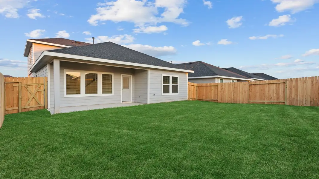 Exterior details and patio area of a home in Tamarron, Fulshear (Image 3).