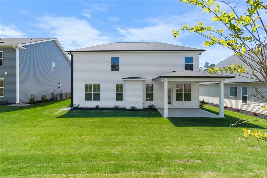 Backyard | 5065 Anna Creek Way, The Kingsland II Plan in Forrest Bluff by Ivey Homes Backyard | 5065 Anna Creek Way, The Kingsland II Plan in Forrest Bluff by Ivey Homes