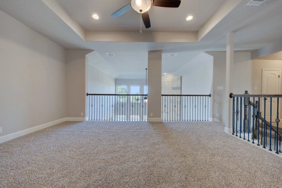 Representative unfurnished interior of a home built from the Barnett by Ashton Woods in Sunday Creek at Kinder Ranch, San Antonio (Image 30).