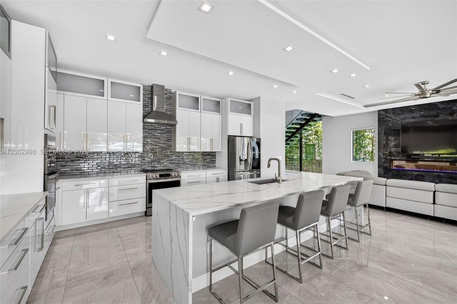 Chef's kitchen w/ counter seating, quartz waterfalls, 2 ovens, pot filler, tons of storage, KraftMaid cabinets