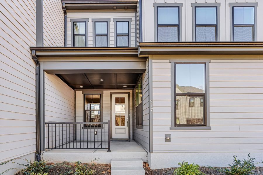 Exterior details and patio area of a home in Seven Oaks, Belmont (Image 3).