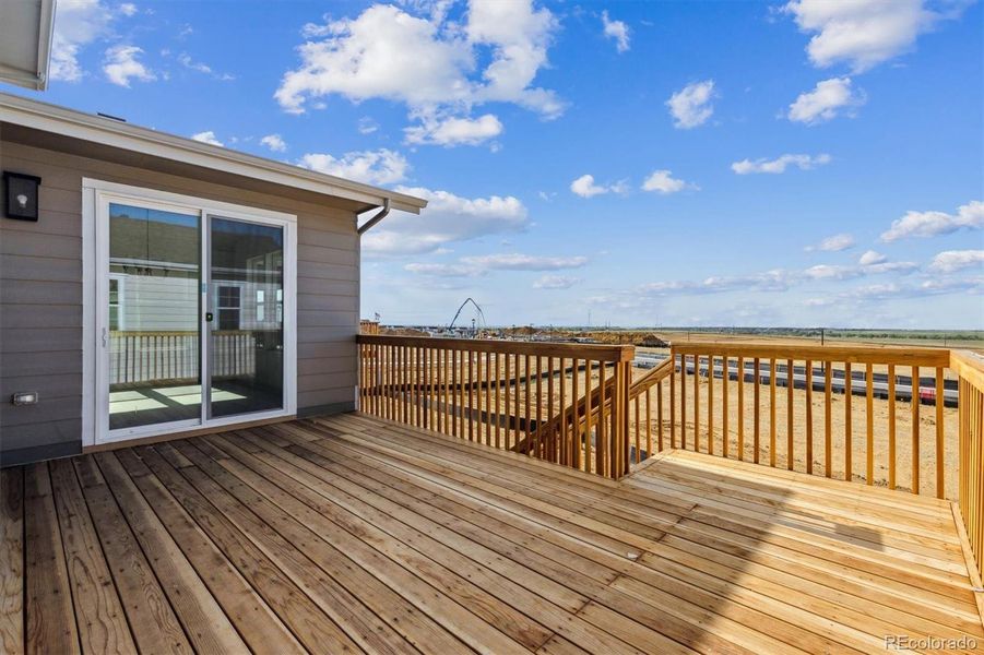 Exterior details and patio area of a home in Harvest Crossing, Aurora (Image 2).