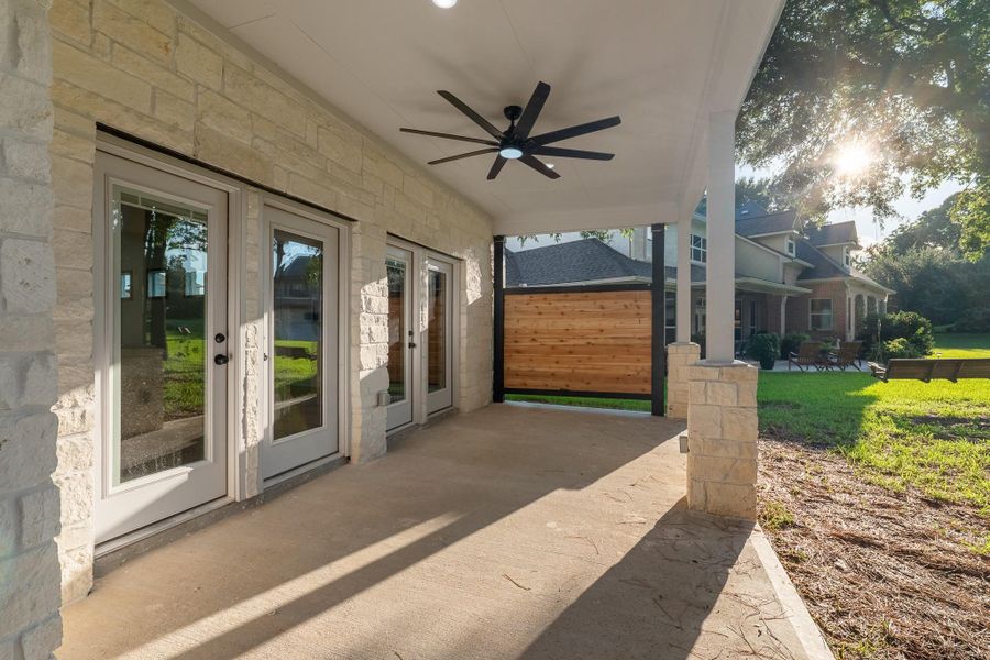 Spacious back patio perfect for relaxation and entertaining. Spacious back patio perfect for relaxation and entertaining.