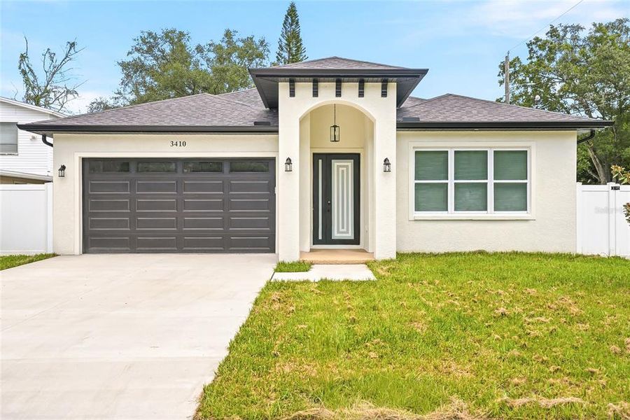Front exterior of a new home in , Tampa, FL, highlighting curb appeal (Image 2). Front exterior of a new home in , Tampa, FL, highlighting curb appeal (Image 2).