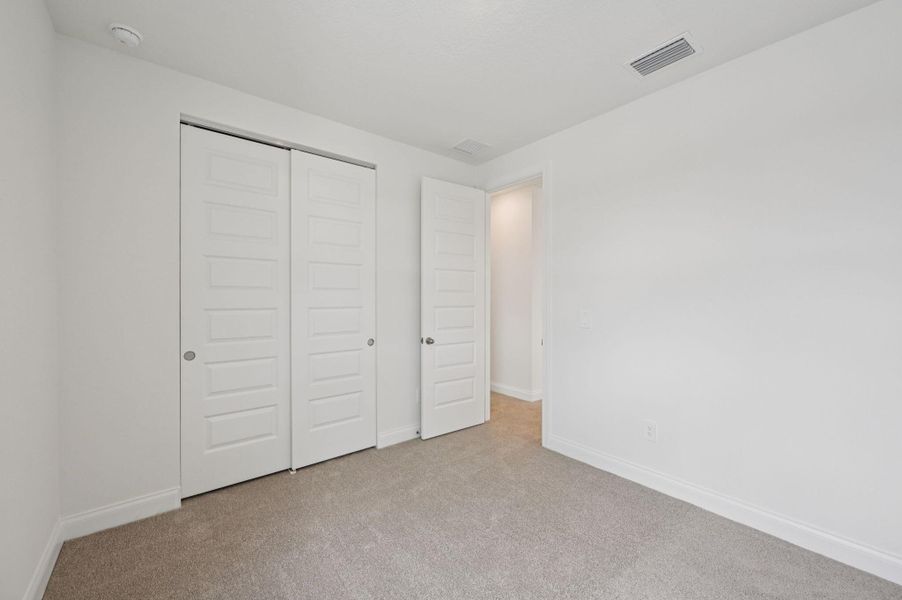 Spacious, unfurnished interior of a new home in Brystol at Wylder - Reserve Series, Port St. Lucie (Image 31).