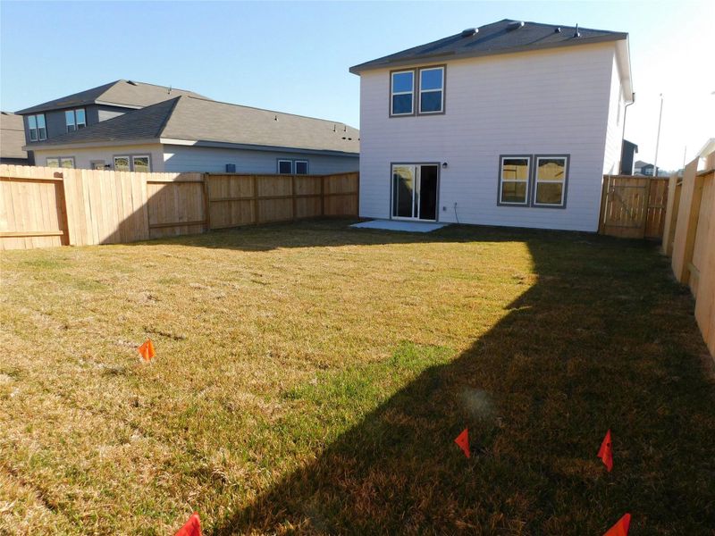 Exterior details and patio area of a home in Royal Pines, Porter (Image 19).